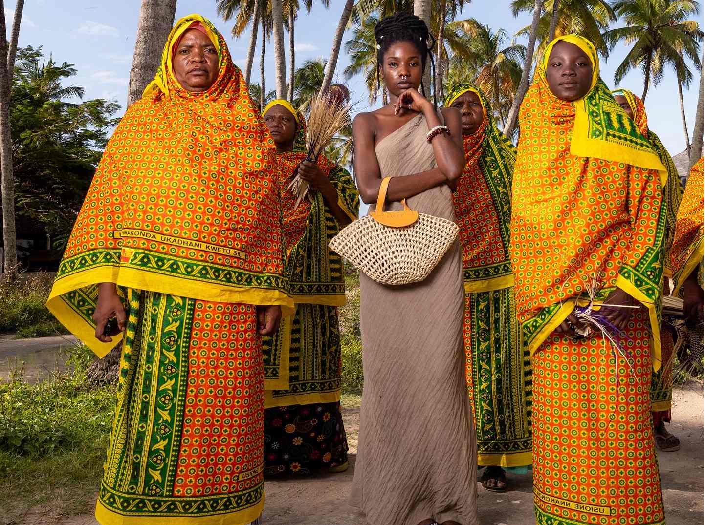 a group of women in colorful traditional attire