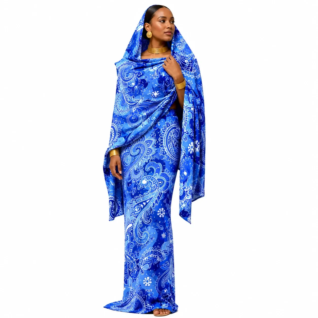 How Buyers Agree Payment Terms for Sudanese Toub Wholesale Orders(图1) Model wearing a blue Sudanese Toub with white floral and paisley prints.webp
